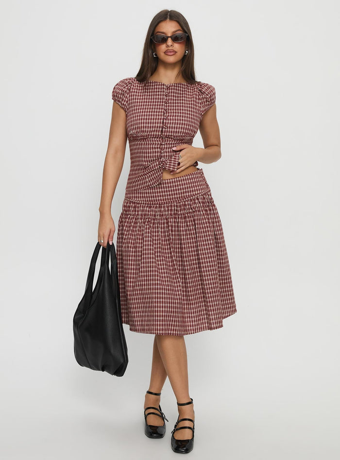 side view of model wearing Princess Polly Alixandra Ruched Midi Skirt Red Check Midi Skirts