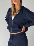 back view of model wearing Princess Polly All Day Oversized Hoodie Navy cropped