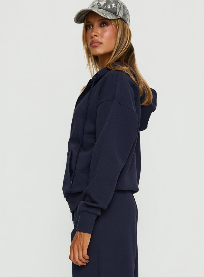 side view of model wearing Princess Polly All Day Oversized Hoodie Navy cropped