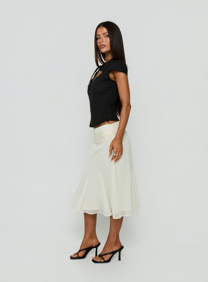 Crafted with the Ambrosea Panelled Midi Skirt Cream womens-skirts featuring aline shape side view of model wearing Princess Polly