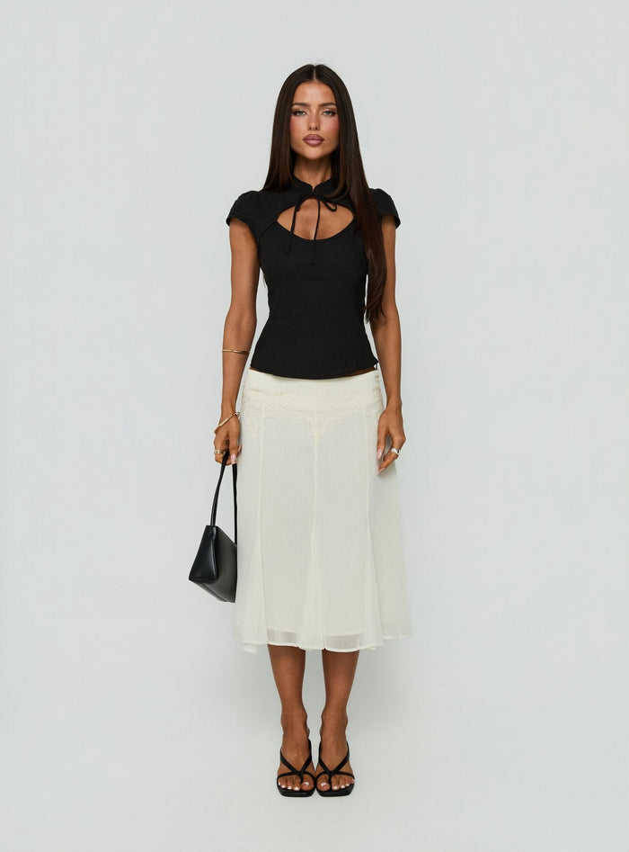 Showcasing the Ambrosea Panelled Midi Skirt Cream womens-skirts with midi length front view of model wearing Princess Polly