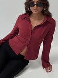 side view of model wearing Princess Polly Anni Pinstripe Shirt Red Full Sleeves V-Neck