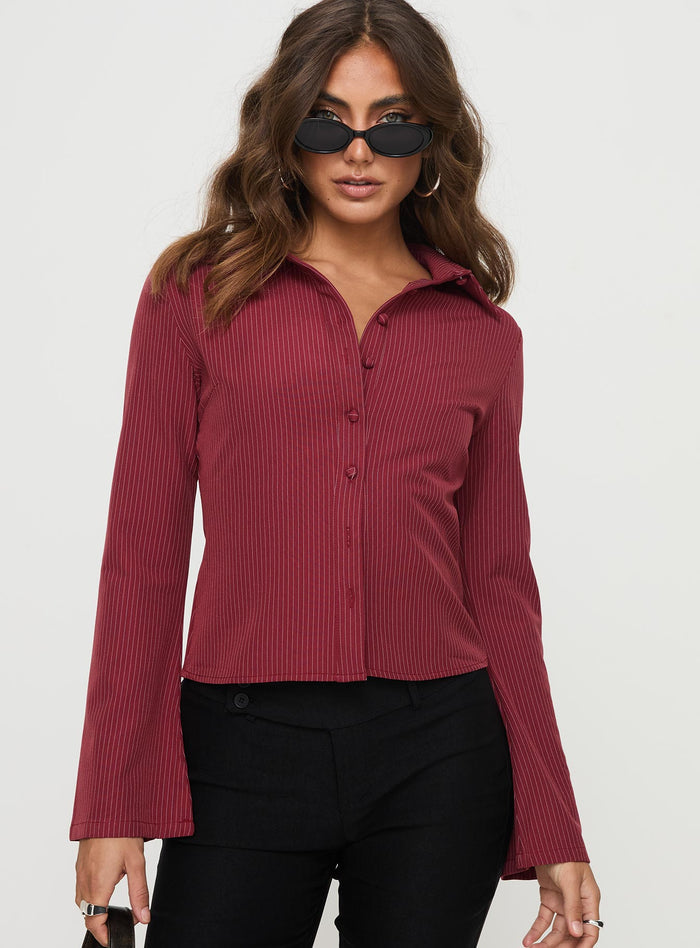 front view of model wearing Princess Polly Anni Pinstripe Shirt Red Full Sleeves V-Neck