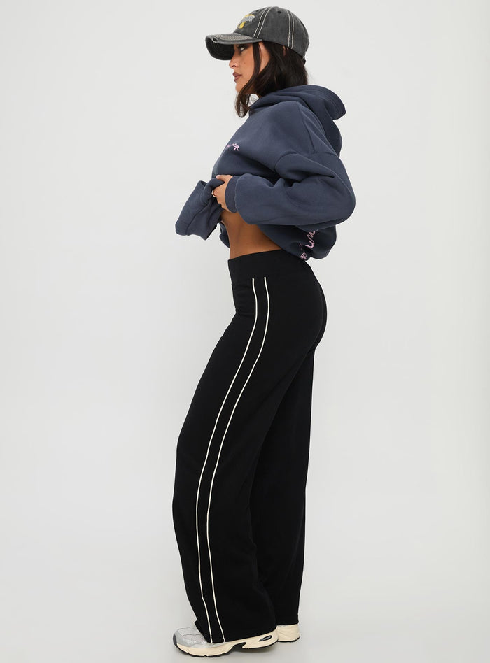 side view of model wearing Princess Polly Ascenda Straight Leg Track Pant Black High Waisted Pants