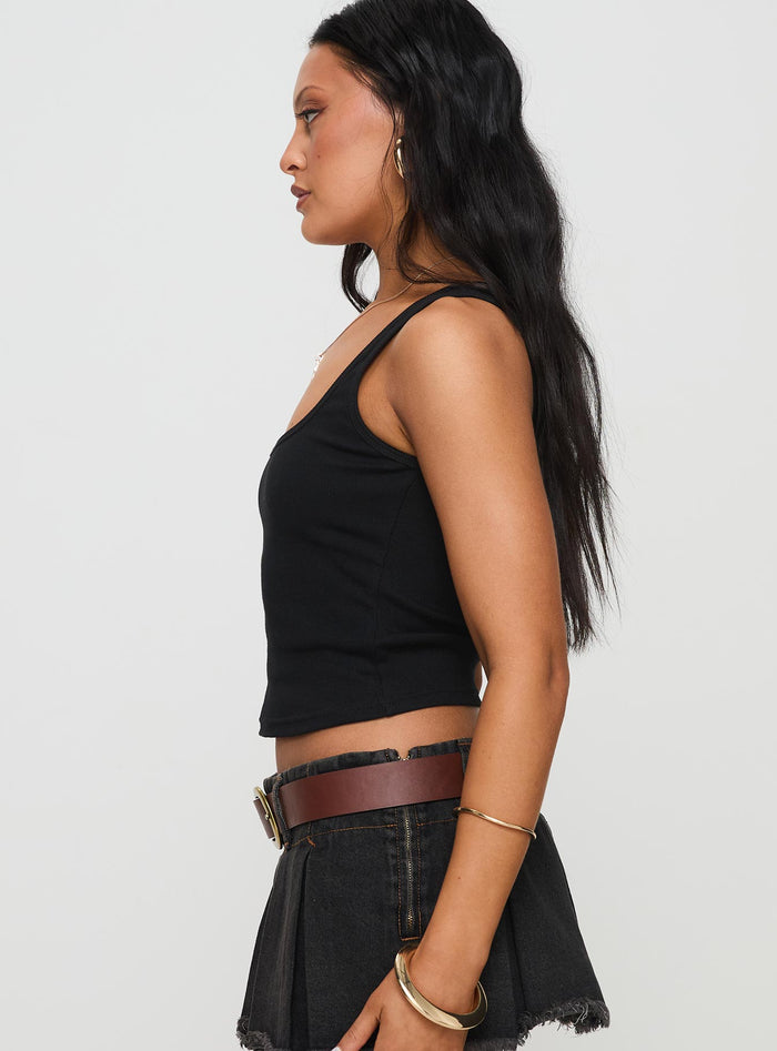 side view of model wearing Princess Polly Baseline Square Neck Rib Tank Top Black Sleeveless Square Neck