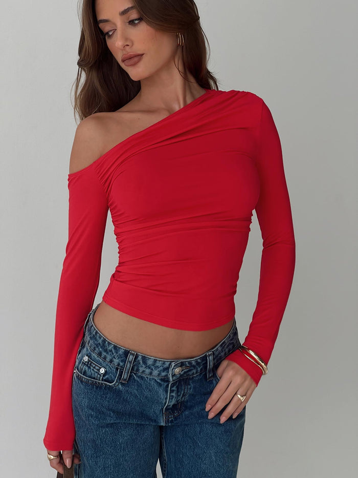 front view of model wearing Princess Polly Beller Long Sleeve Top Red Full Sleeves Asymmetric Neckline