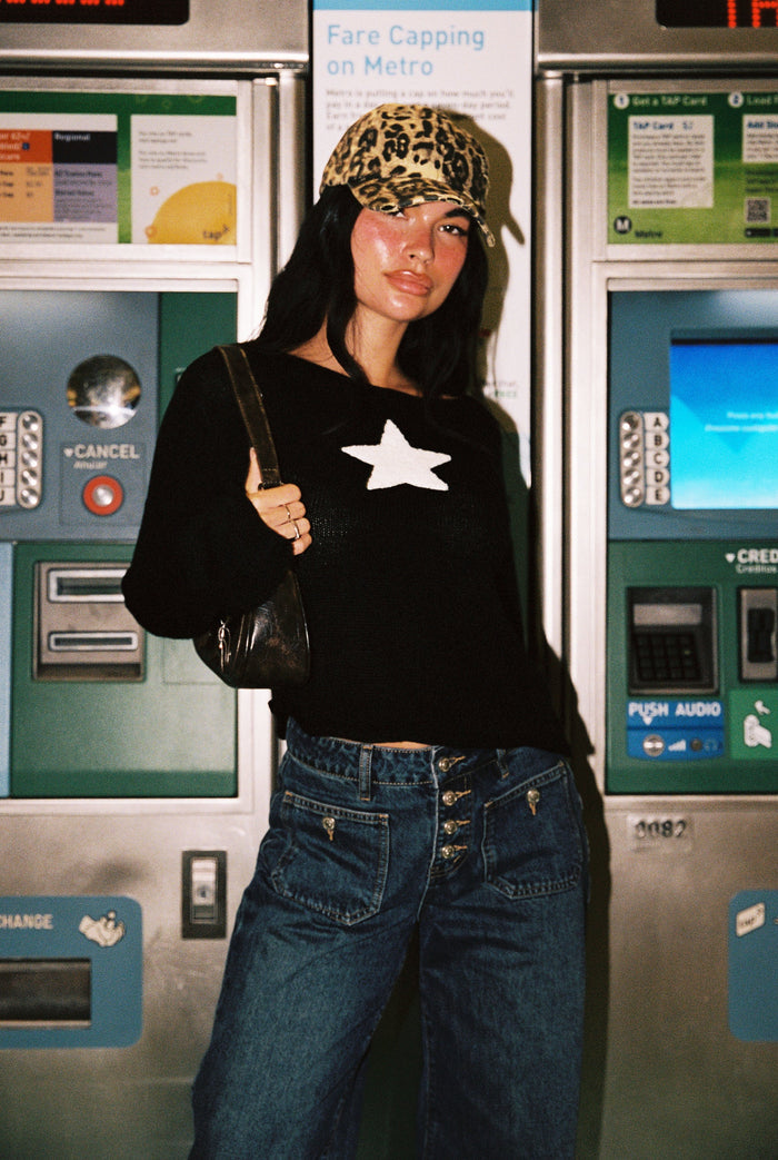 back view of model wearing Princess Polly Big Star Knit Sweater Black Cropped