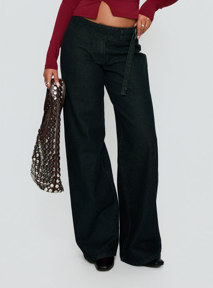 side view of model wearing Princess Polly Boxie Mid Rise Wide Leg Jeans Washed Black Mid Rise Jeans Jeans