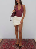 back view of model wearing Princess Polly Brandey Lace Mini Skirt Cream Mini Skirts Skirts