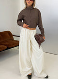 Showcasing the Bungala Oversized Relaxed Pants Ivory womens-regular-pants in high-rise wide-leg silhouette front view of model wearing Princess Polly