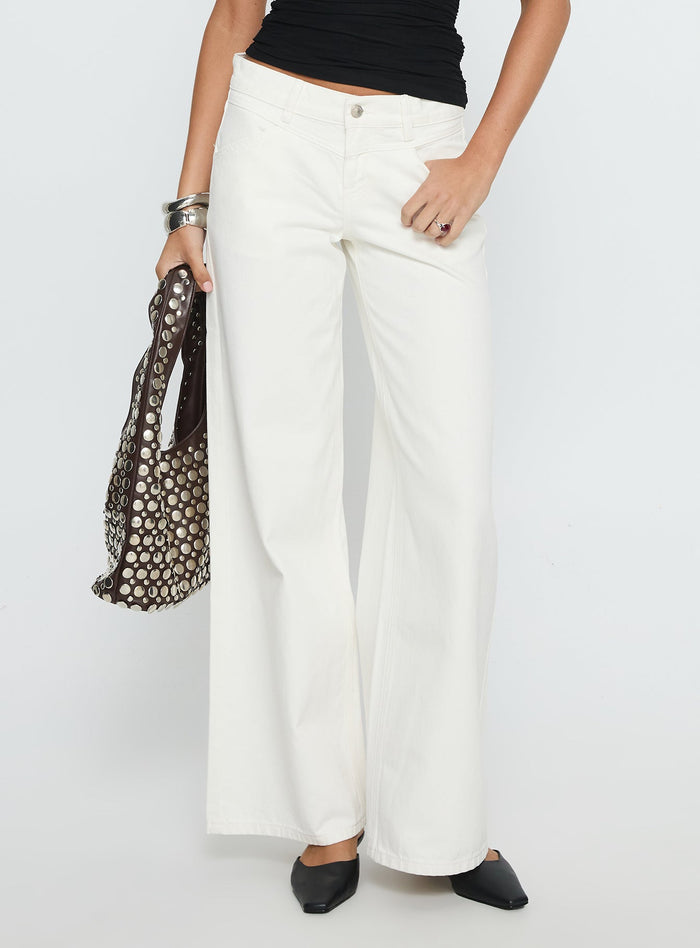 front view of model wearing Princess Polly Catiana Low Rise Wide Leg Jeans White Low Rise Jeans