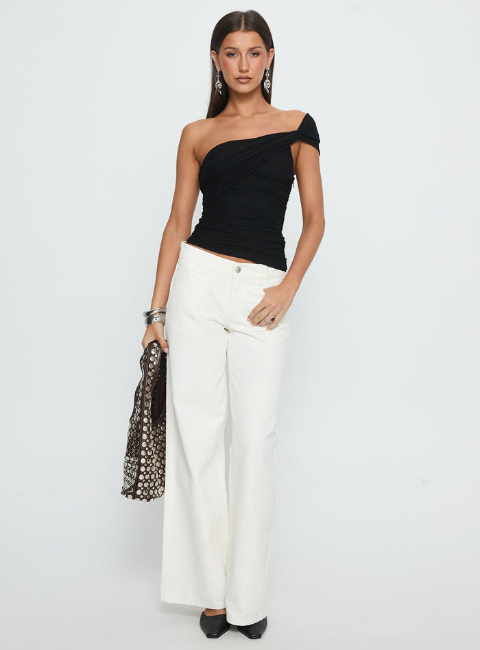 side view of model wearing Princess Polly Catiana Low Rise Wide Leg Jeans White Low Rise Jeans