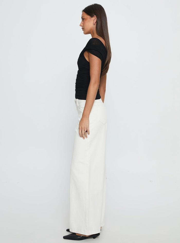 side view of model wearing Princess Polly Catiana Low Rise Wide Leg Jeans White Low Rise Jeans