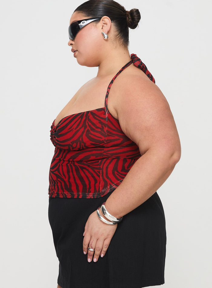 side view of model wearing Princess Polly Cielo Mesh Halter Top Red Zebra Curve Sleeveless Plunger
