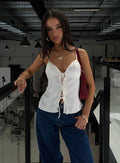 front view of model wearing Princess Polly City Scene Top White Sleeveless Plunger
