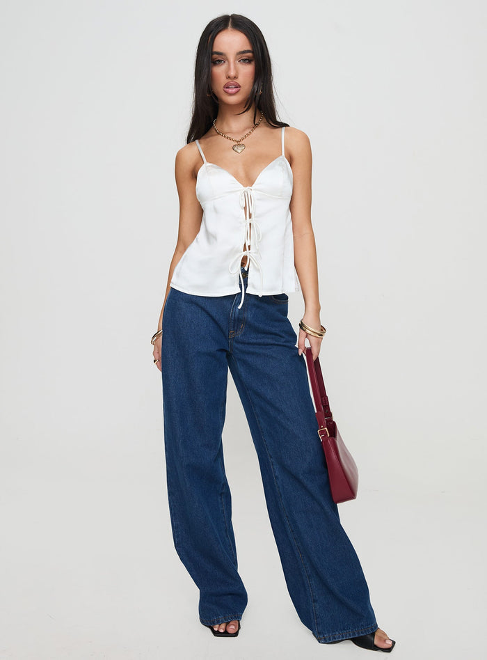 front view of model wearing Princess Polly City Scene Top White Sleeveless Plunger
