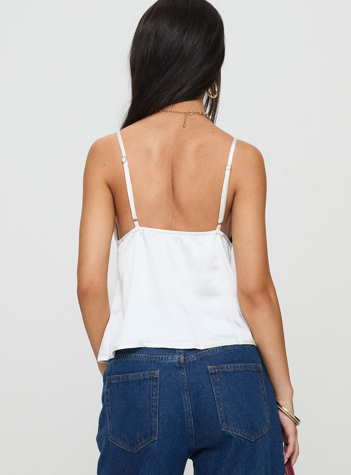 back view of model wearing Princess Polly City Scene Top White Sleeveless Plunger