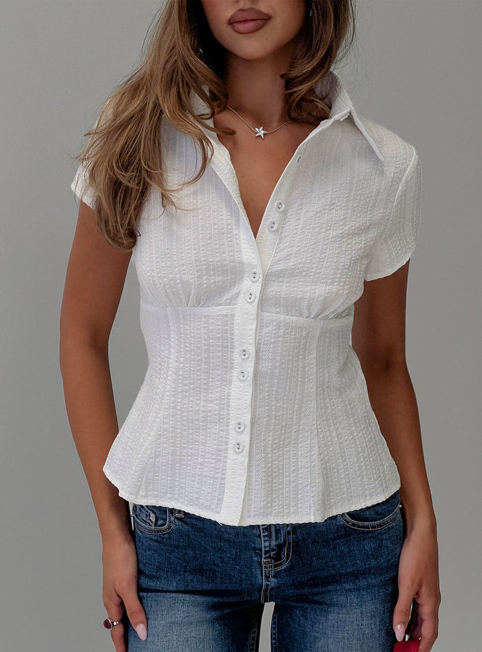 front view of model wearing Princess Polly Cottesloe Blouse Top Textured White Short Sleeves V-Neck