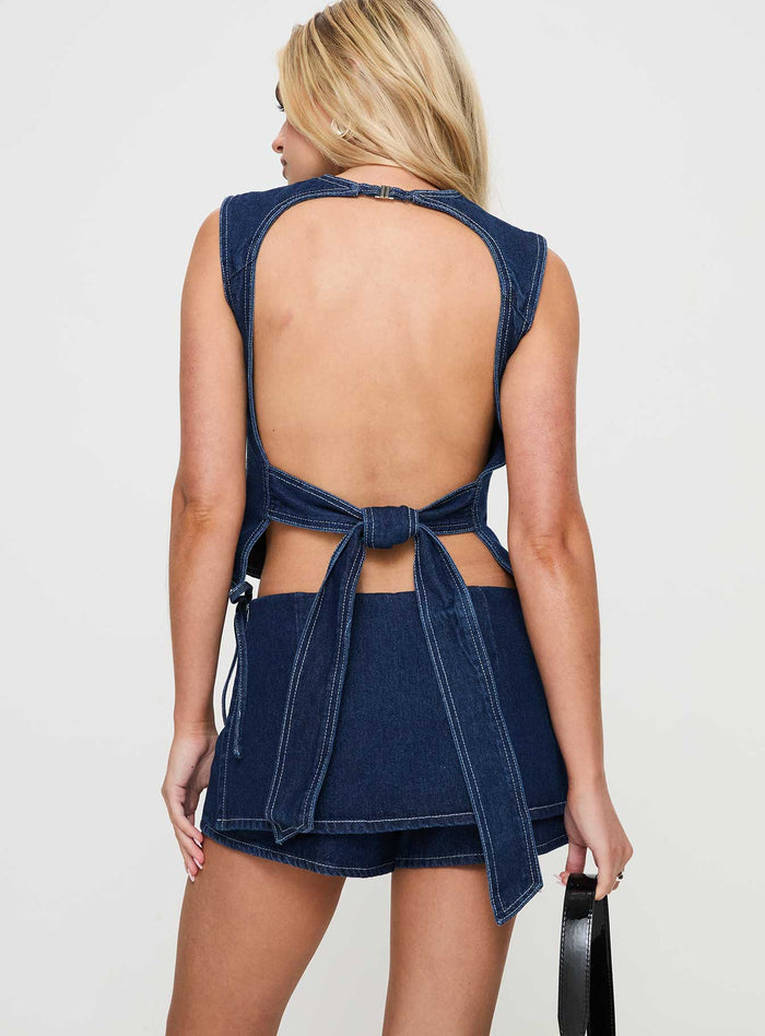 back view of model wearing Princess Polly Countryside Skort Blue Denim Low Rise Shorts