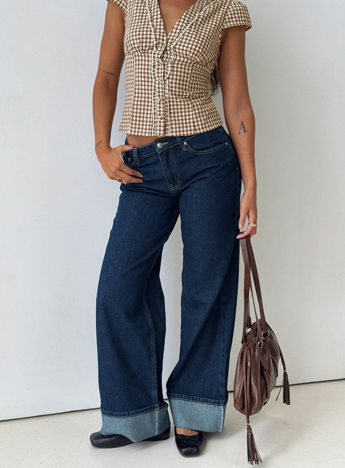 front view of model wearing Princess Polly Darla Low Rise Straight Leg Cuff Jean Dark Blue Wash Low Rise Jeans Jeans