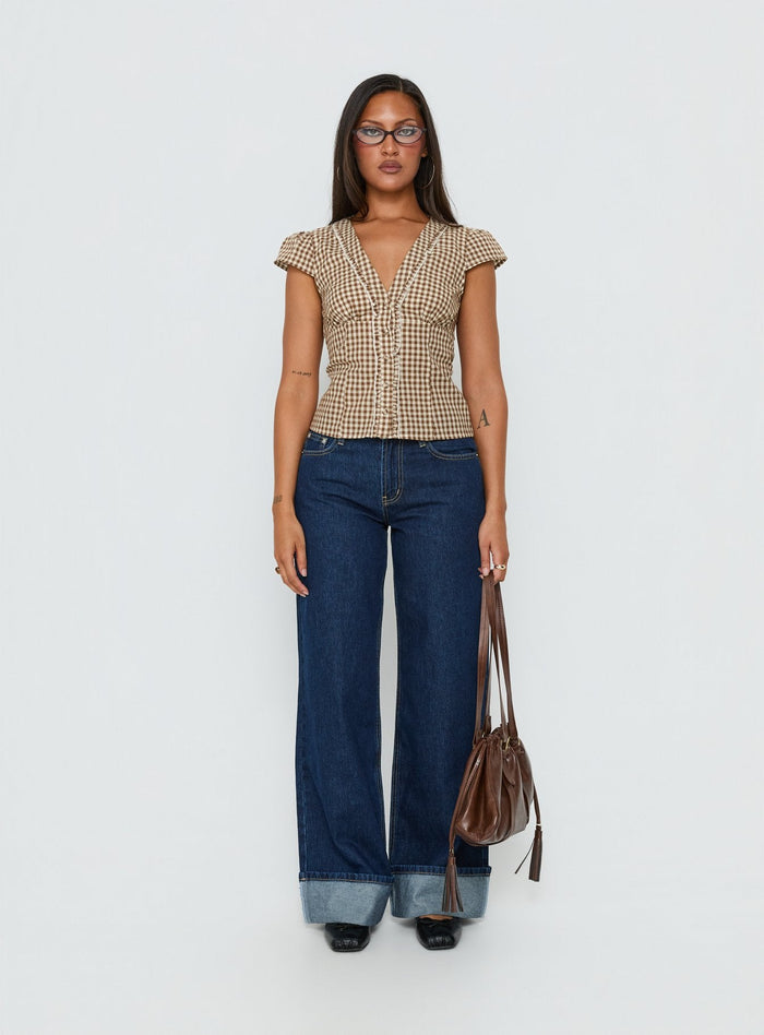 front view of model wearing Princess Polly Darla Low Rise Straight Leg Cuff Jean Dark Blue Wash Low Rise Jeans Jeans
