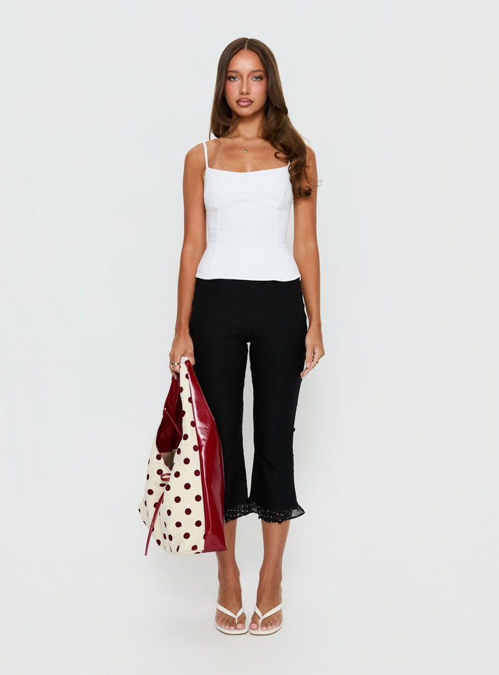 front view of model wearing Princess Polly Darsie Frill Capri Black Polka Dot High Rise Pants