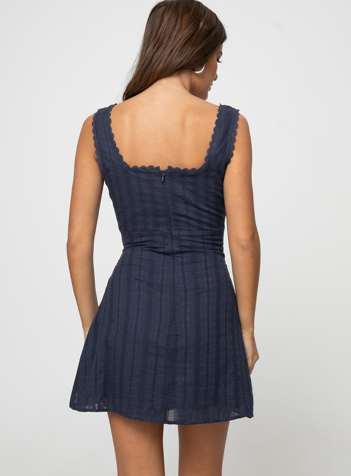 back view of model wearing Princess Polly Dasha Mini Dress Navy Tall Square Neck