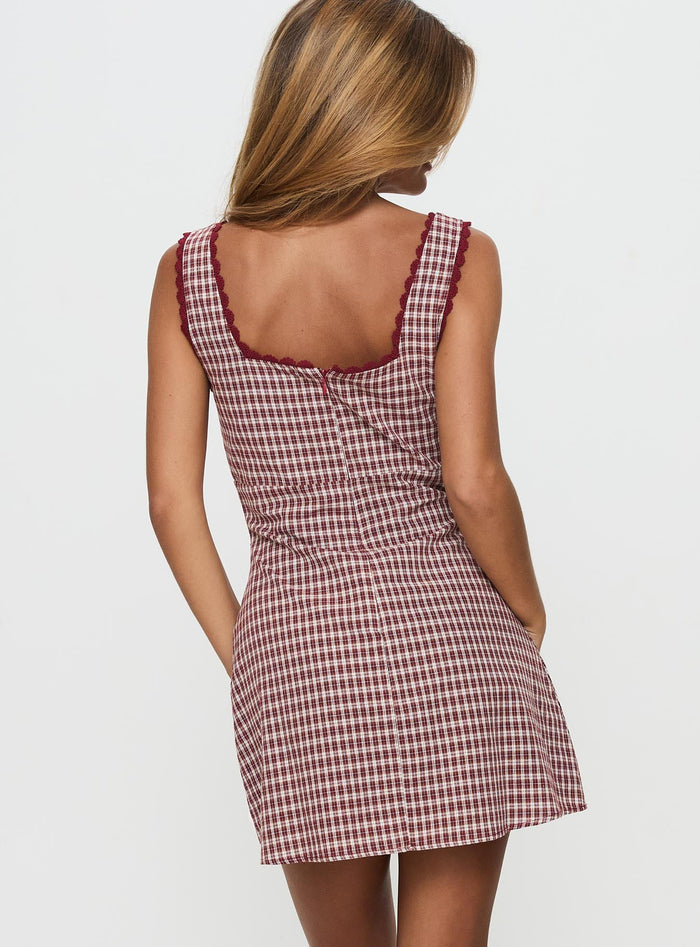 back view of model wearing Princess Polly Dasha Mini Dress Red Check Petite Square Neck