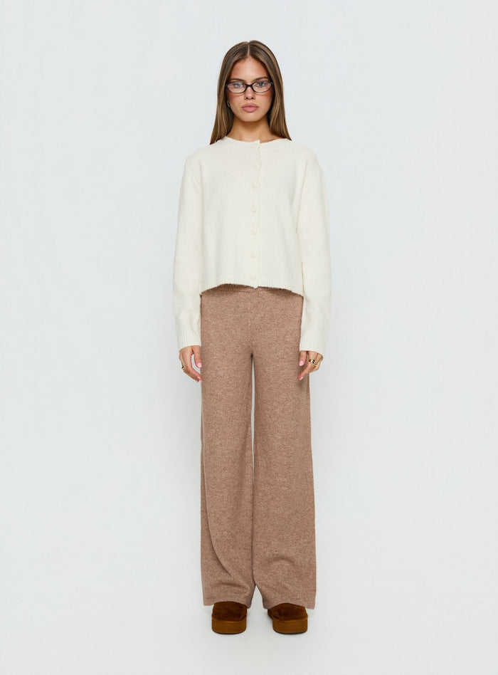 side view of model wearing Princess Polly Denmark Cardigan White Cropped Jumpers Jumpers