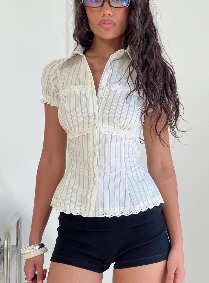 front view of model wearing Princess Polly Deserve You Puff Sleeve Button Front Top Cream Stripe Short Sleeves V-Neck