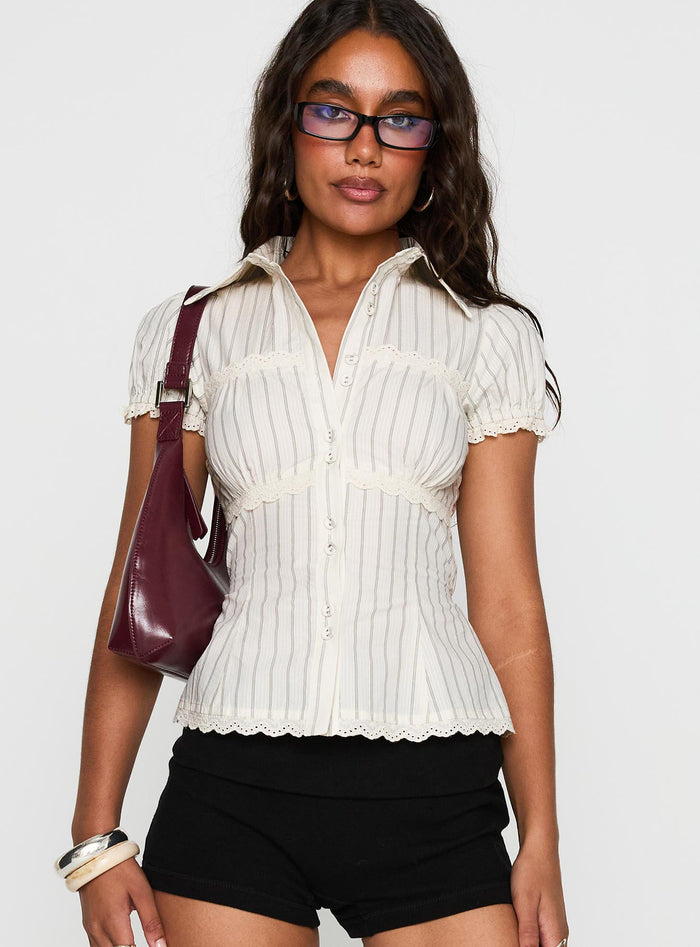 front view of model wearing Princess Polly Deserve You Puff Sleeve Button Front Top Cream Stripe Short Sleeves V-Neck