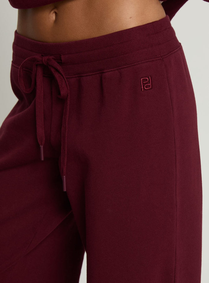 side view of model wearing Princess Polly Dodie Wide Leg Pants Washed Currant Mid Rise Pants