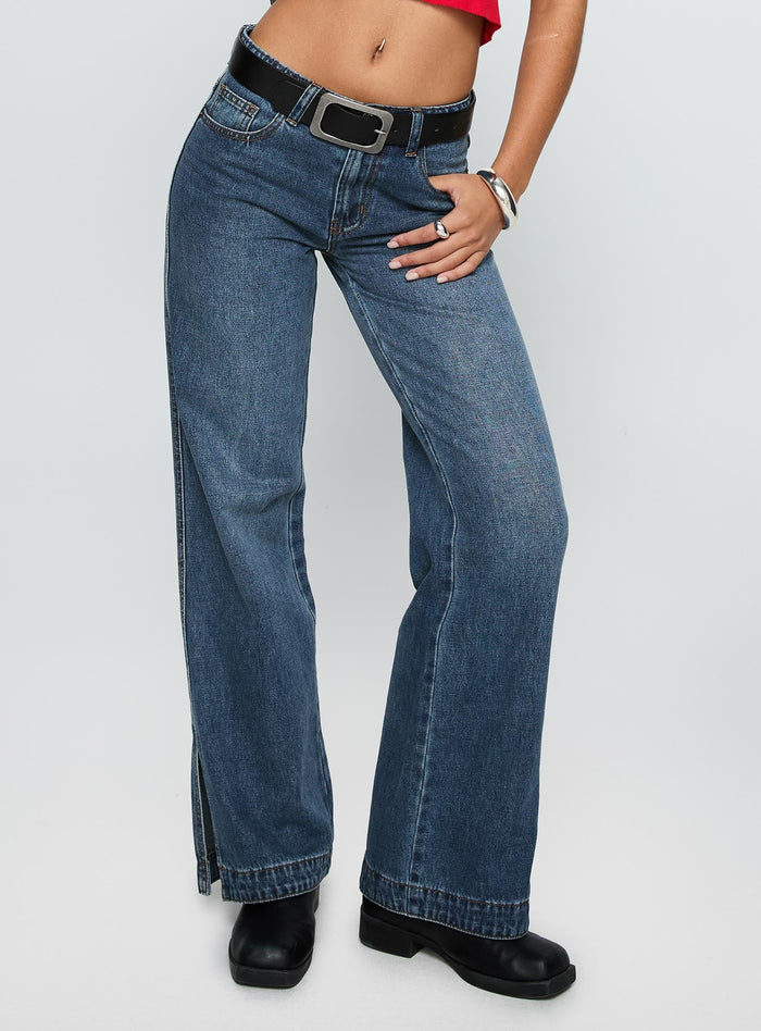 back view of model wearing Princess Polly Dog Days Mid Rise Straight Leg Jeans Dark Blue Wash Mid Rise Jeans