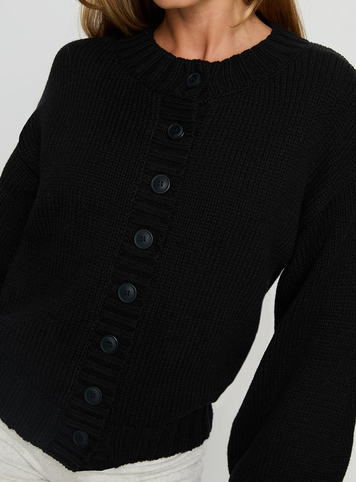 back view of model wearing Princess Polly Edern Cardigan Black Cropped Jumpers