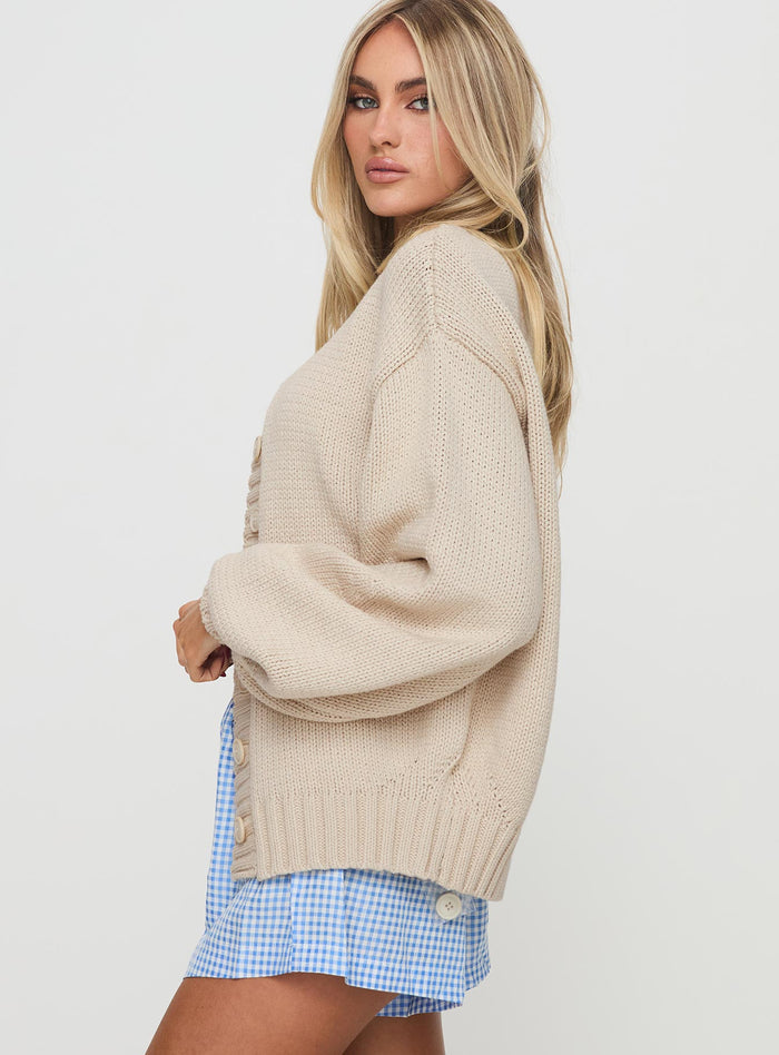 side view of model wearing Princess Polly Edern Cardigan Cream Long
