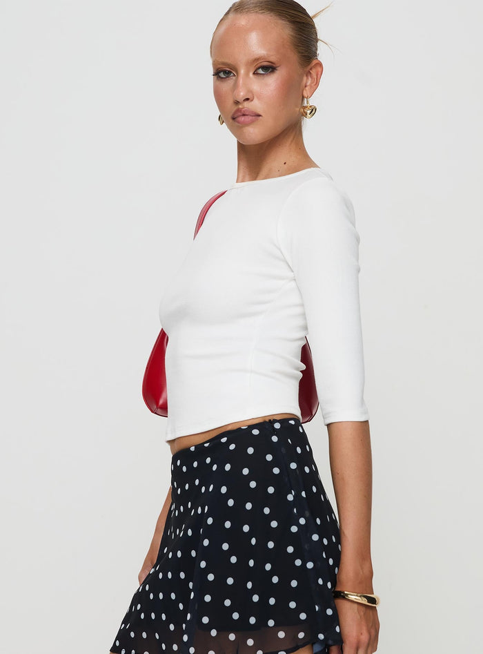 side view of model wearing Princess Polly Elaia 3/4 Sleeve Top White Three Fourth Sleeves Crew Neck