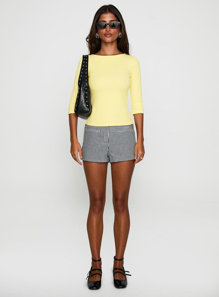 back view of model wearing Princess Polly Elaia 3/4 Sleeve Top Yellow Three Fourth Sleeves Crew Neck