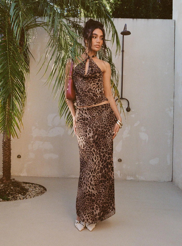 side view of model wearing Princess Polly Eleganza Maxi Skirt Leopard Maxi
