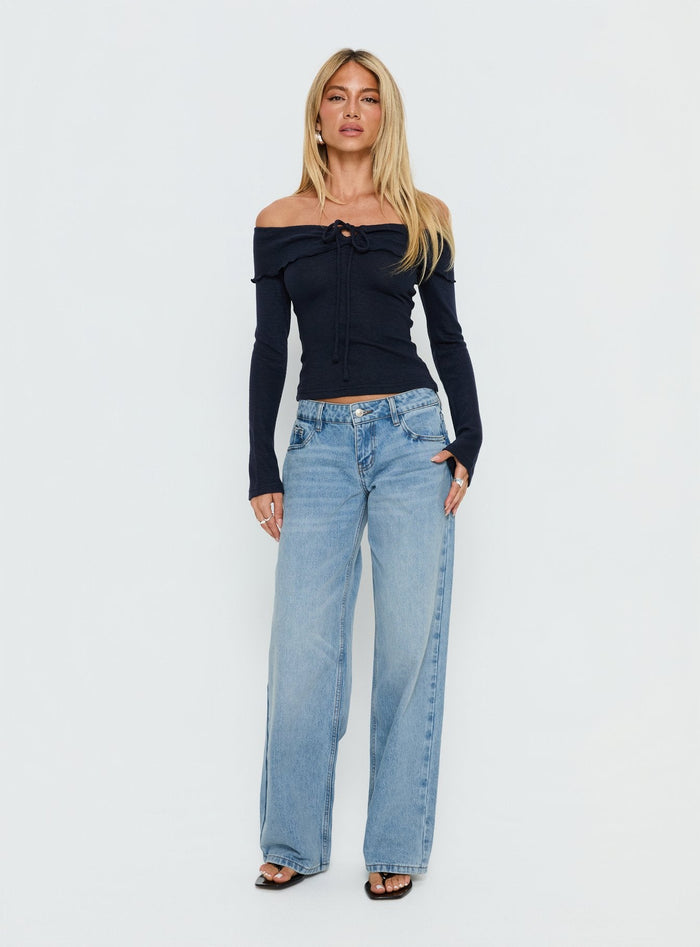 front view of model wearing Princess Polly Ellanor Low Rise Slouch Denim Jean Washed Mid Blue Wash Low Rise Jeans