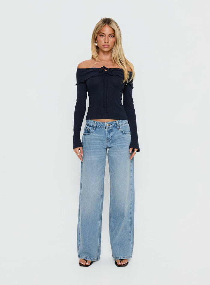 front view of model wearing Princess Polly Ellanor Low Rise Slouch Denim Jean Washed Mid Blue Wash Low Rise Jeans