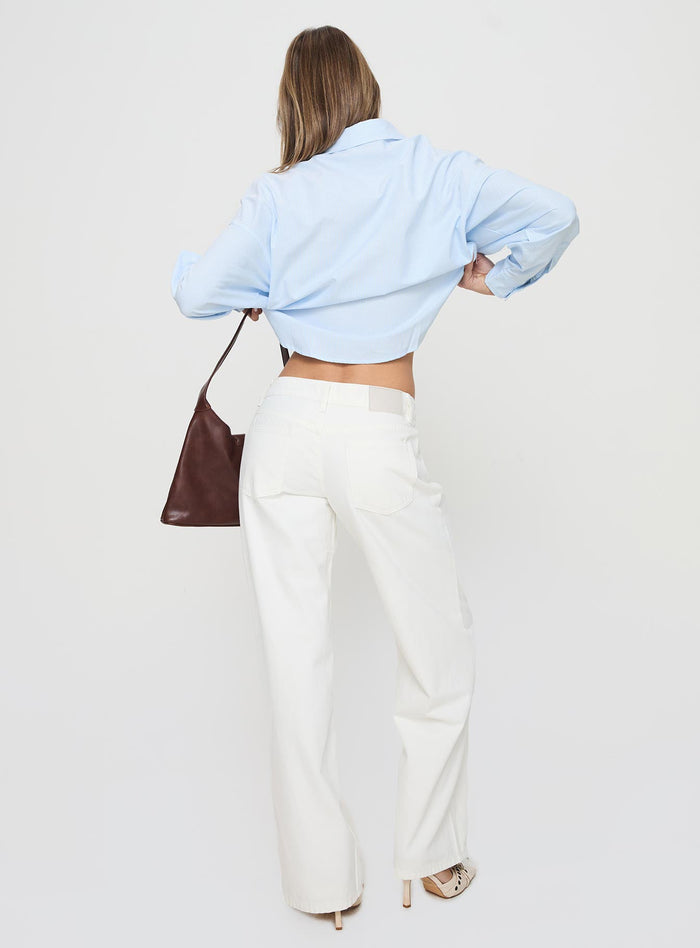 back view of model wearing Princess Polly Ellanor Low Rise Straight Leg Jeans White Mid Rise Jeans