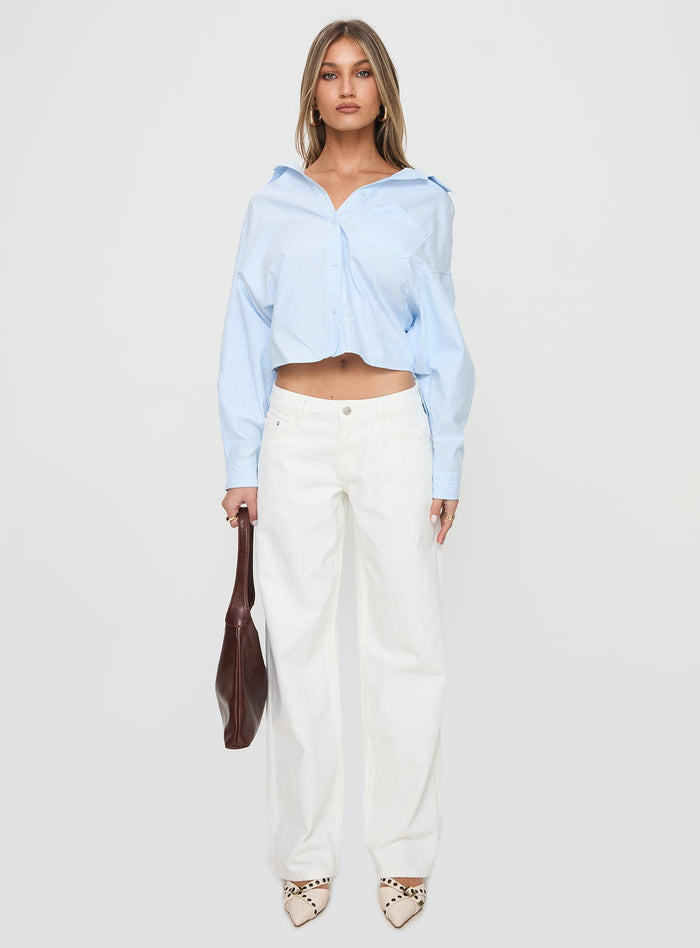front view of model wearing Princess Polly Ellanor Low Rise Straight Leg Jeans White Mid Rise Jeans