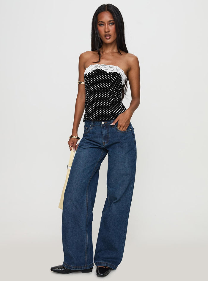 front view of model wearing Princess Polly Ettore Lace Trim Strapless Top Black Polka Sleeveless straight