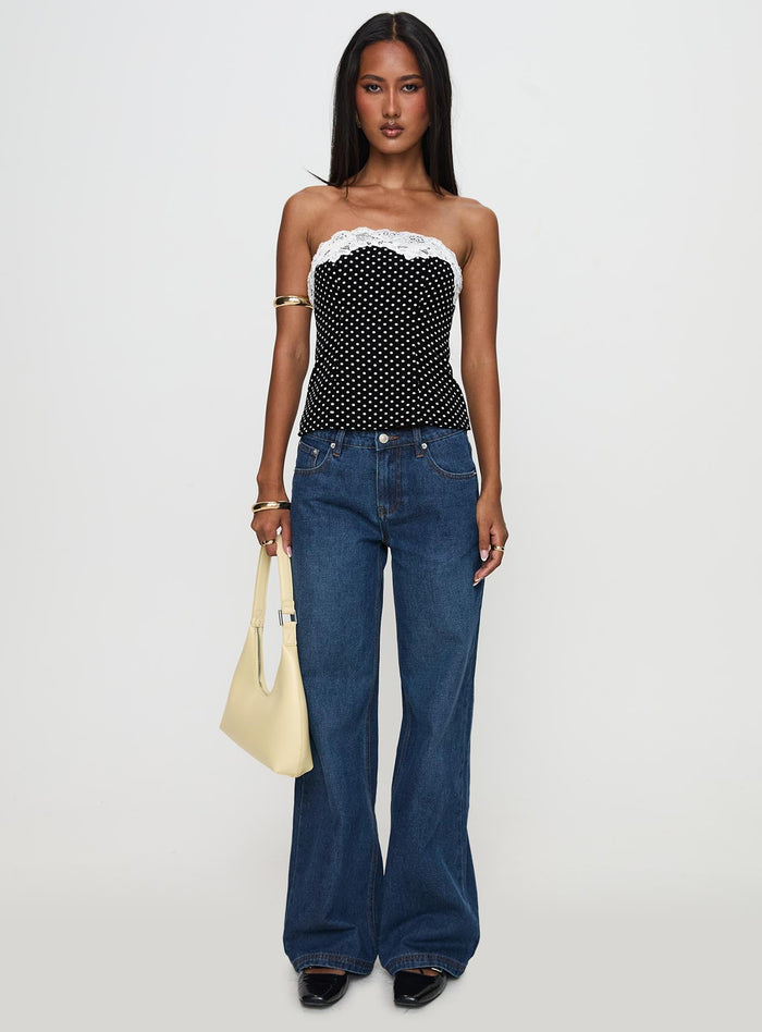 front view of model wearing Princess Polly Ettore Lace Trim Strapless Top Black Polka Sleeveless straight