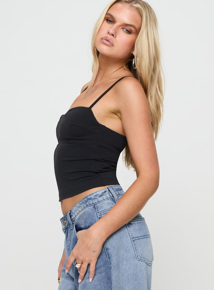 side view of model wearing Princess Polly Evanda Top Black Sleeveless Sweetheart