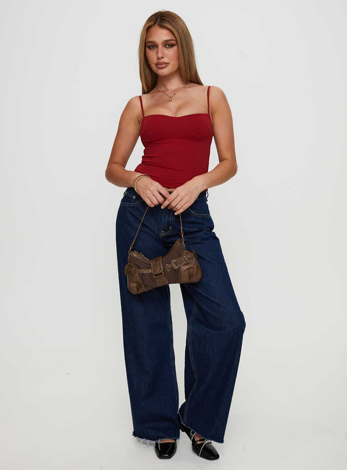 side view of model wearing Princess Polly Evanda Top Burgundy Sleeveless Sweetheart