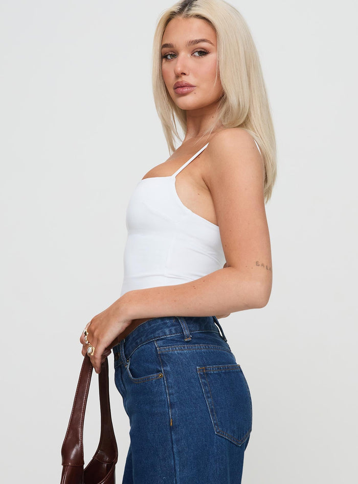 side view of model wearing Princess Polly Evanda Top White Sleeveless Sweetheart