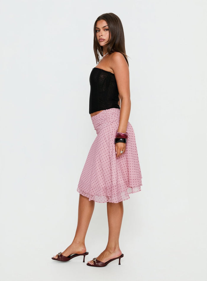 side view of model wearing Princess Polly Evanescence Asymmetrical Midi Skirt Pink Polka Dot Midi Skirts Skirts