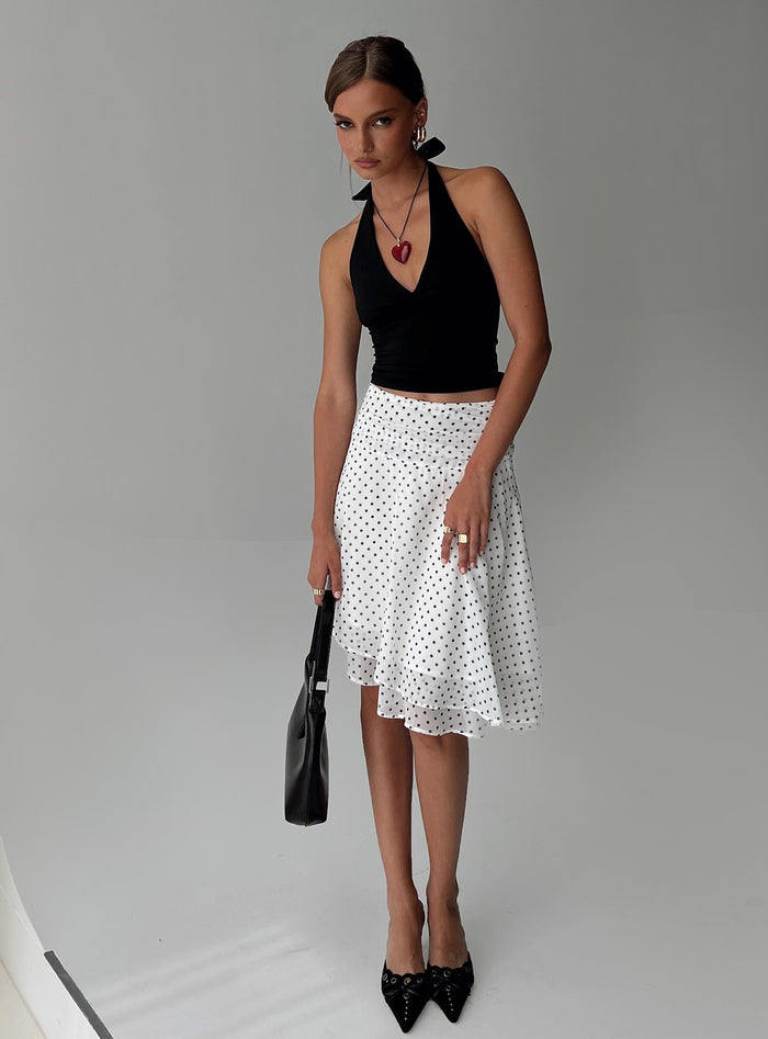 back view of model wearing Princess Polly Evanescence Asymmetrical Midi Skirt White / Polka Dot Midi Skirts