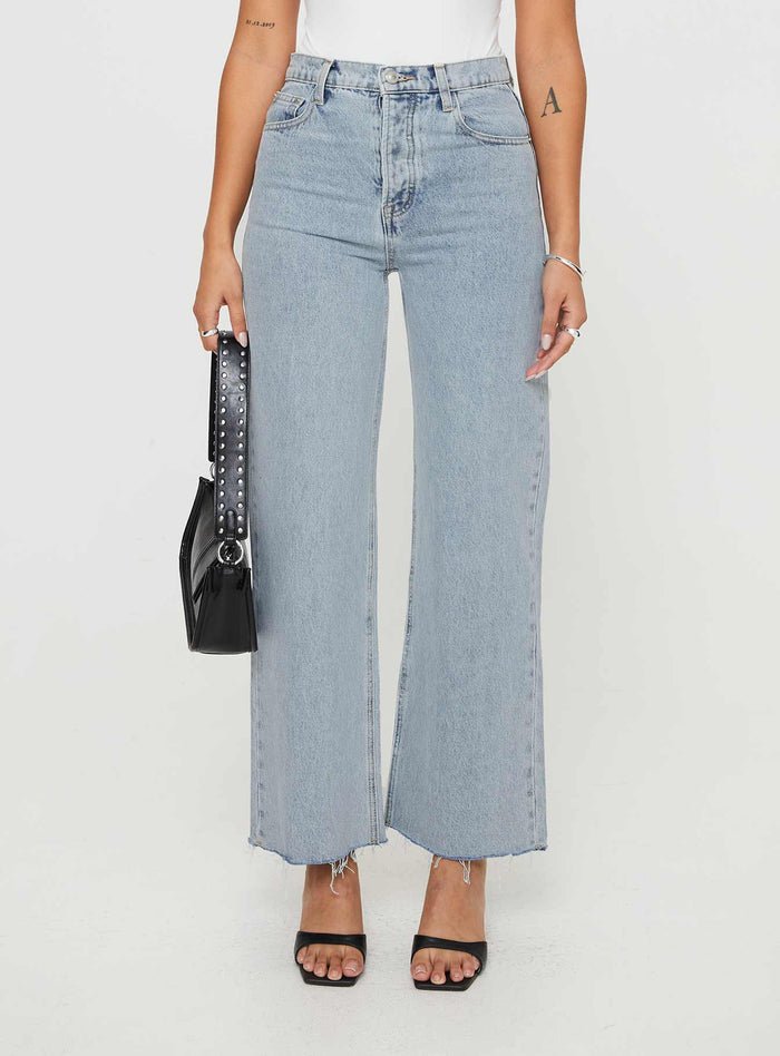 front view of model wearing Princess Polly Fawcett Jeans Light Wash Denim High Waisted
